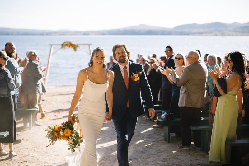 New Hampshire wedding photography portfolio — bride and groom recessional at lakeside ceremony