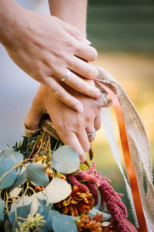 Wedding bouquet toss reception moment